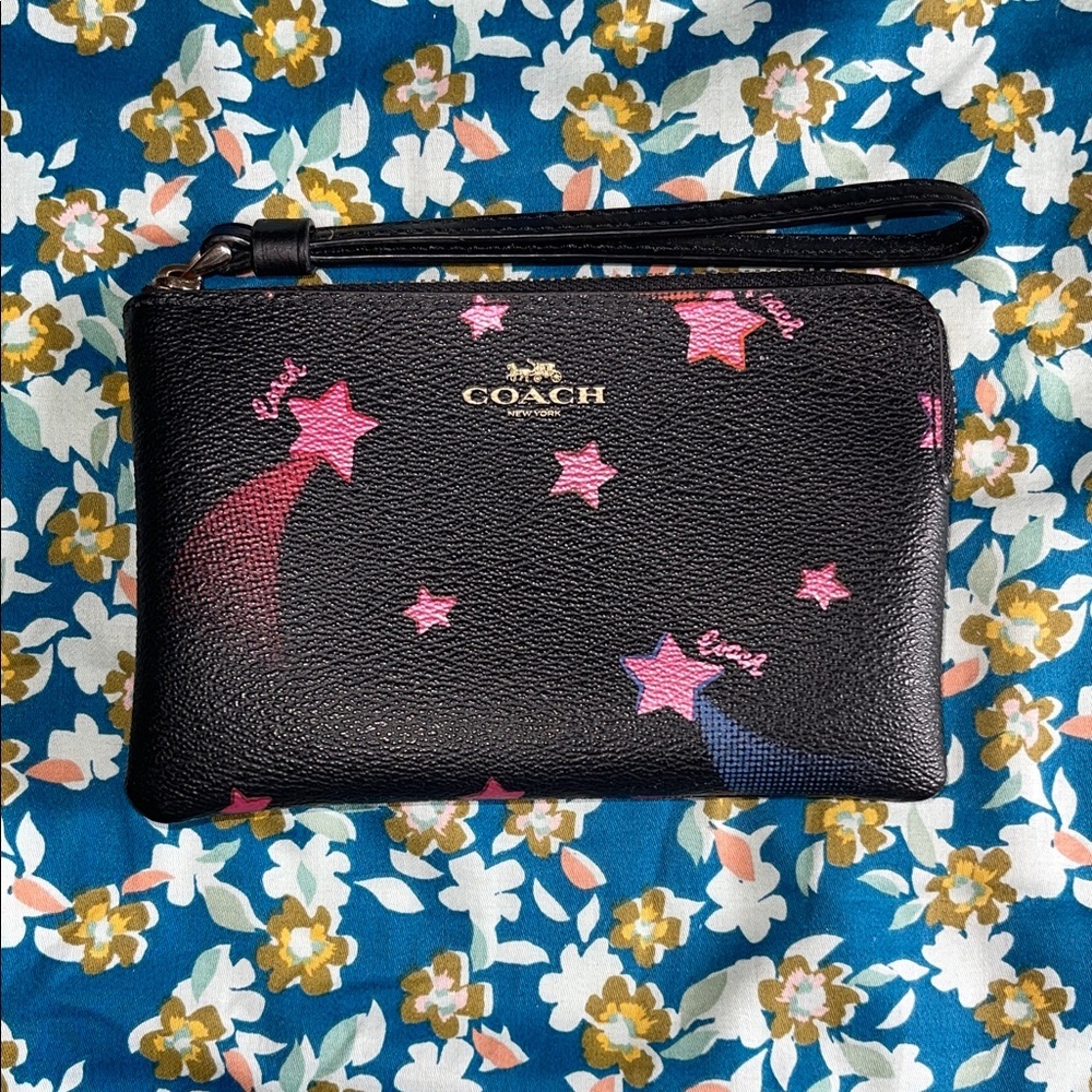 Coach Black Pebbled Leather Wristlet with Pink Star Motif